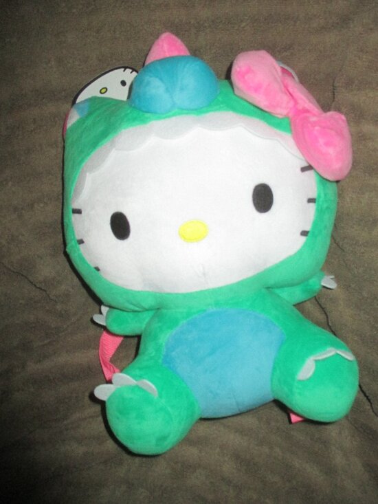 dino hello kitty backpack Moonkie Hug & Go Rexie the Dinosaur The adjustable shoulder straps ensure a comfortable and secure fit Sanrio Hello Kitty Dinosaur Plush